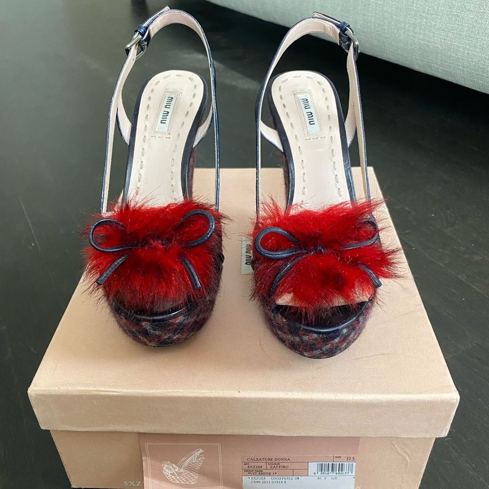 Miu Miu platform sandals.